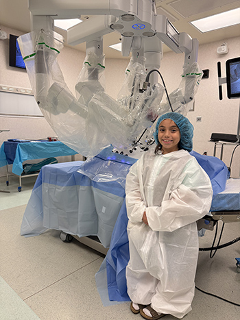 Mallory Cruz posing in surgery theater